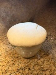Bread dough after rising and ready to shape into loafs.