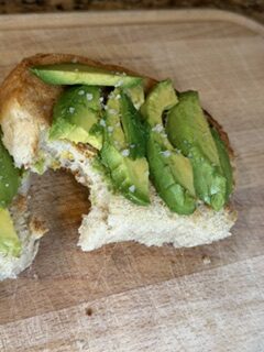 Avocado toast topped with creamy mashed avocado on homemade toasted bread