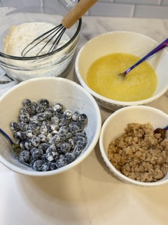 Ingredients for homemade blueberry muffins with crumble topping