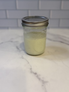 “Jar of fresh buttermilk from homemade butter” ✅