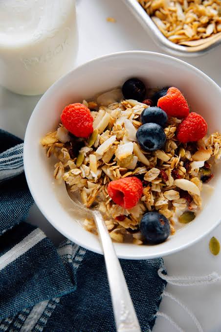 Bowl of oatmeal topped with fresh berries for a homemade breakfast